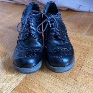 Doc martens brogue style shoes.
